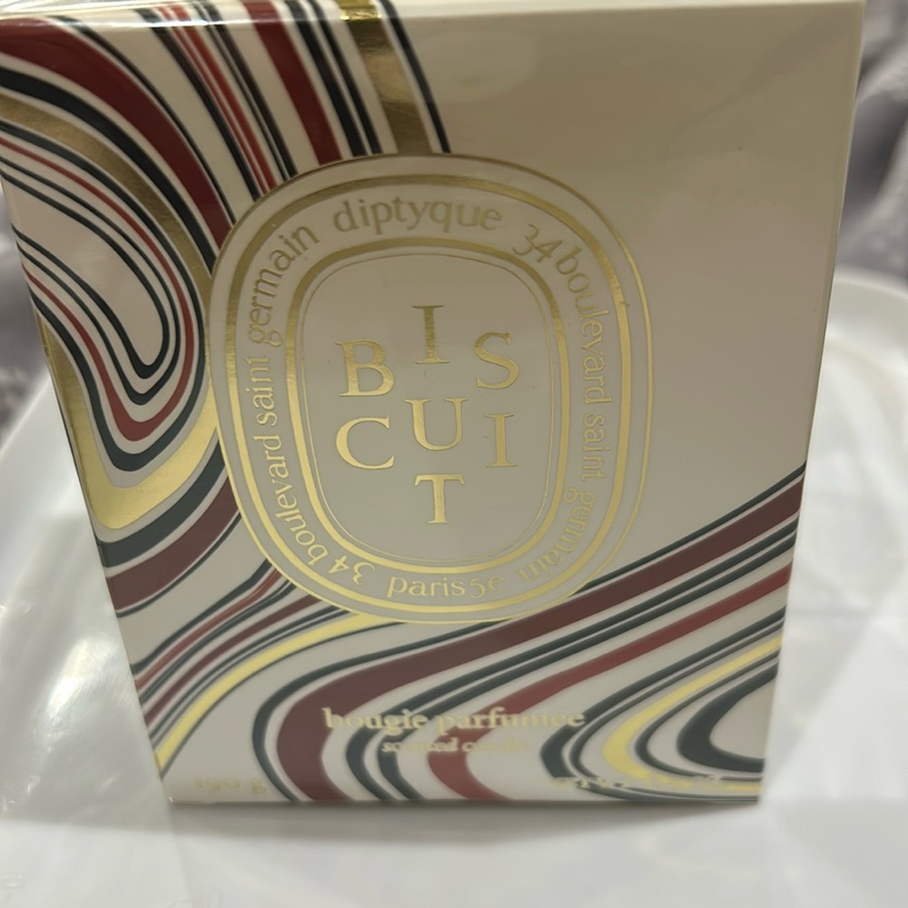 New in box Diptique Biscuit 6.5 ounce candle